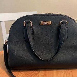 Small Black Kate Spade Purse. Bought in 2019. In decent condition.